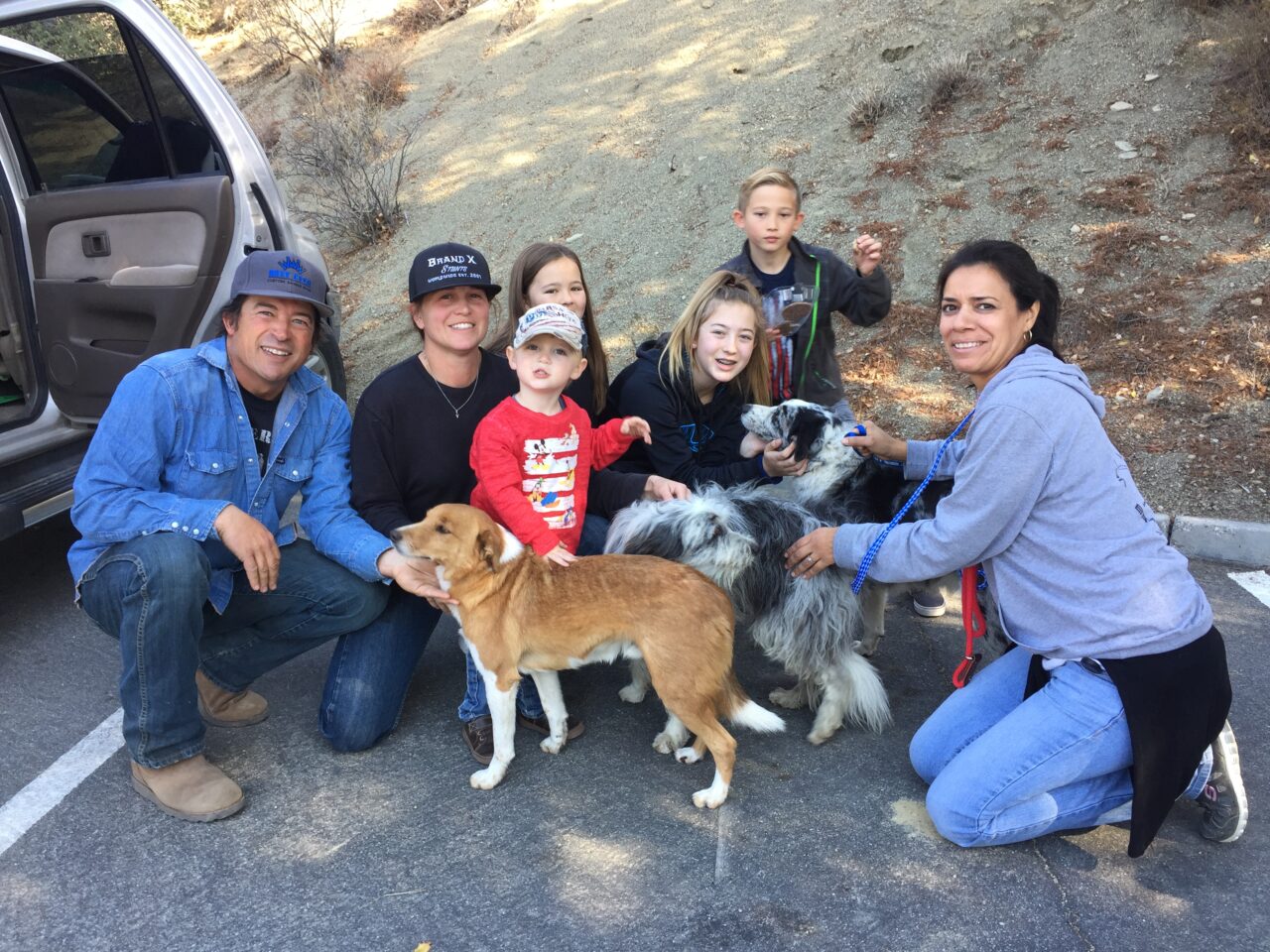 Lorena Zeballos, pictured with a family and their reunited lost pet at Lake Hughes, Castaic. Circa November, 2016.